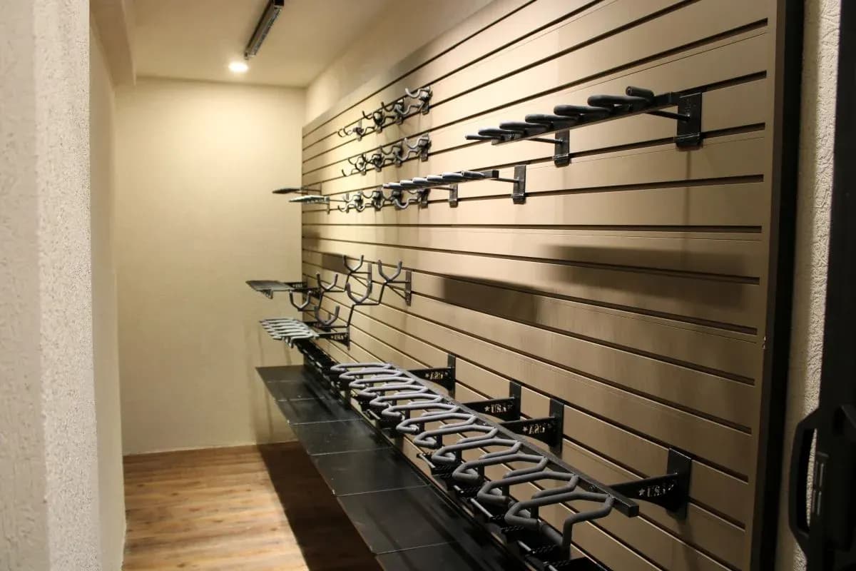 Custom gun safe room addition with wall-mounted storage in Sheridan, WY