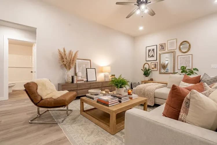 Living room with gallery wall in The Big Horn home model by Buffalo Built LLC.