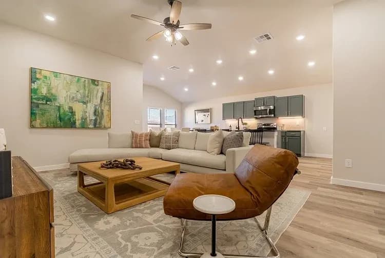 Living room, alternate staging, in The Big Horn home model by Buffalo Built LLC.