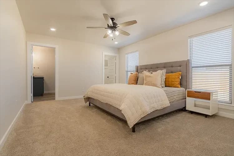 Primary bedroom in The Big Horn home model by Buffalo Built LLC.