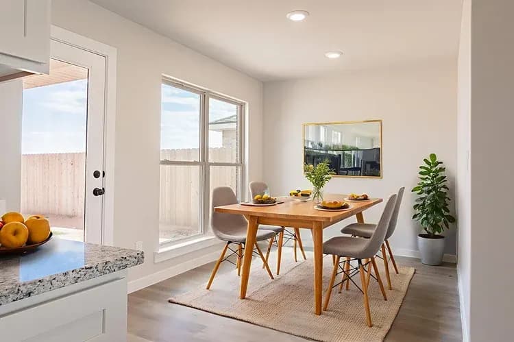 Dining room in The Black Tooth home model by Buffalo Built LLC.