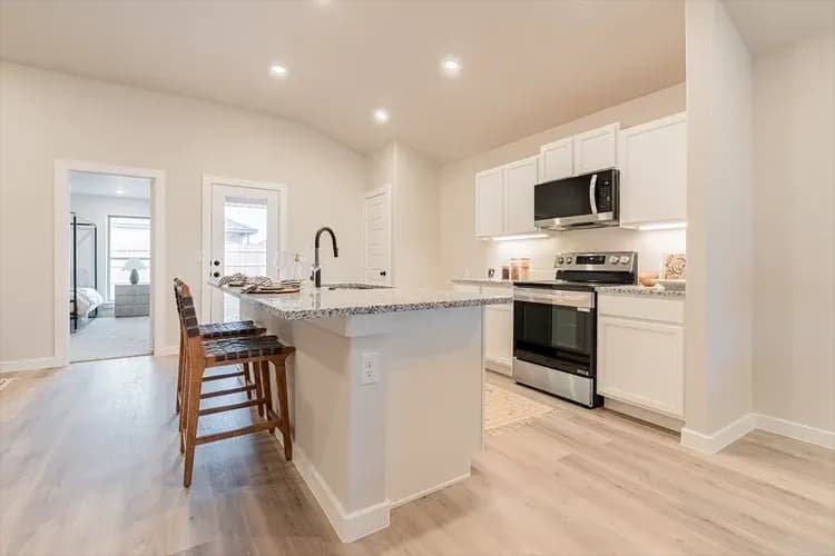 Kitchen in The Bomber Mountain home model by Buffalo Built LLC.