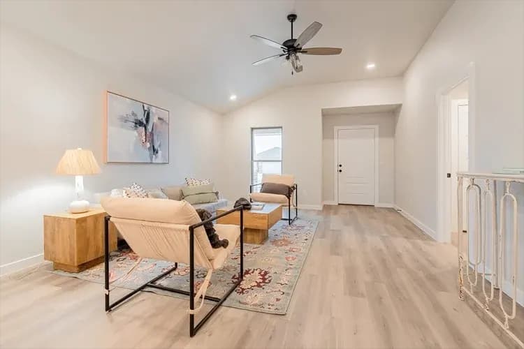 Living room viewed from the front entry in The Bomber Mountain home model by Buffalo Built LLC.