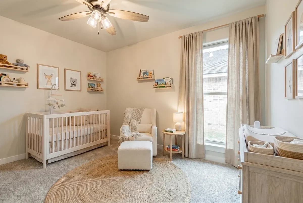 Bedroom staged as a nursery in The Bomber Mountain home model by Buffalo Built LLC.