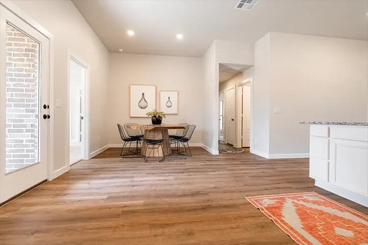 Dining room, alternate staging, in The Clear Creek home model by Buffalo Built LLC.