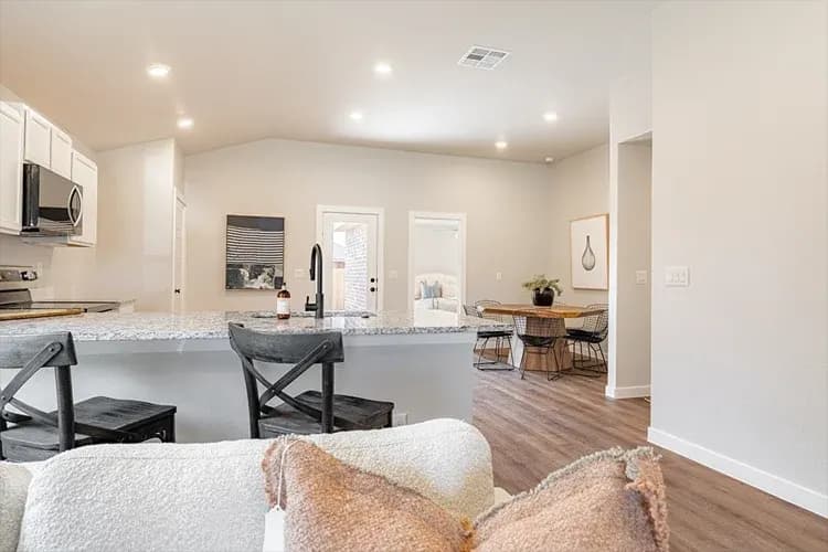 Kitchen and dining area in The Clear Creek home model by Buffalo Built LLC.