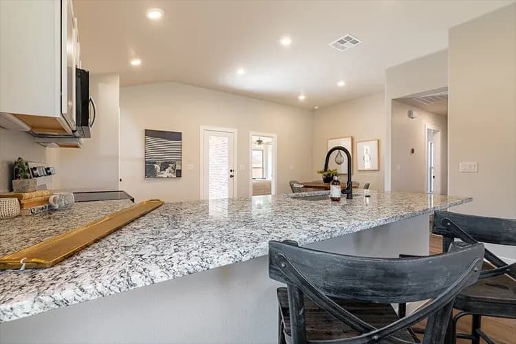 Kitchen island in The Clear Creek home model by Buffalo Built LLC.