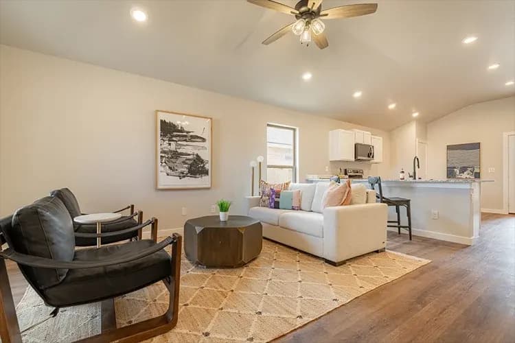 Living room and kitchen in The Clear Creek home model by Buffalo Built LLC.