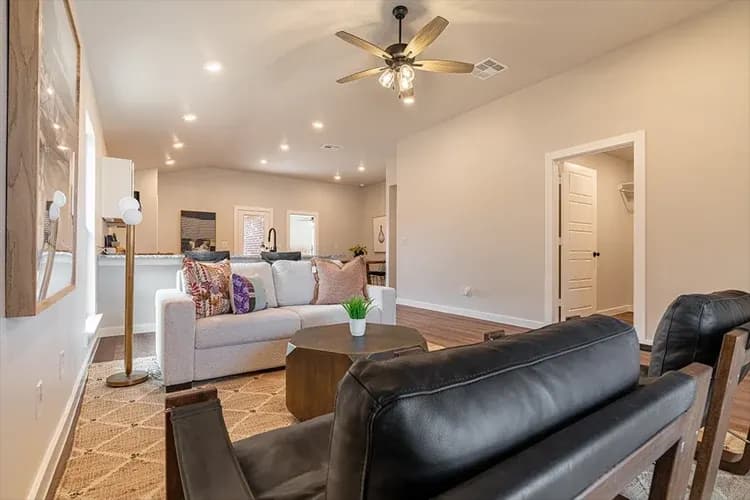 Living room, alternate staging, in The Clear Creek home model by Buffalo Built LLC.