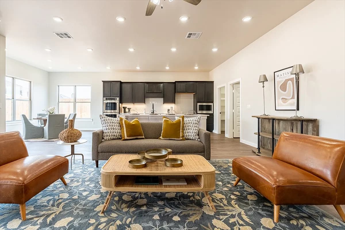 Open living room and kitchen in The Cloud Peak home model by Buffalo Built LLC.