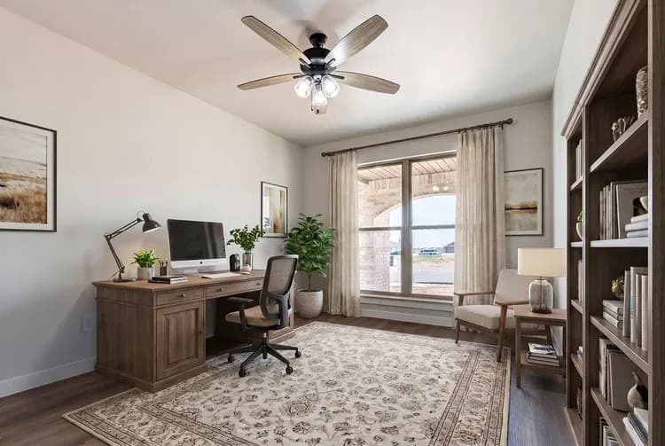Bedroom staged as a home office in The Cloud Peak home model by Buffalo Built LLC.