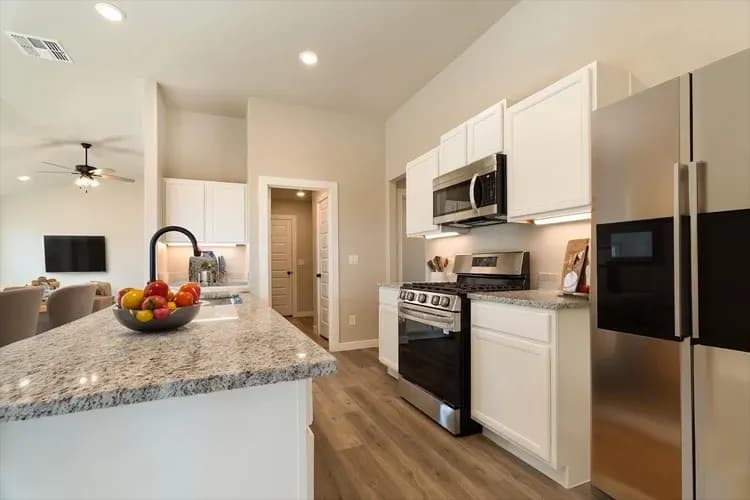 Kitchen in The Crazy Woman home model by Buffalo Built LLC.