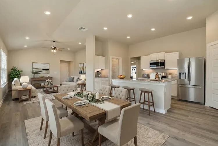 Kitchen and dining area, alternate view, in The Crazy Woman home model by Buffalo Built LLC.