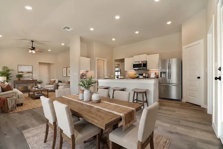 Kitchen and dining area in The Crazy Woman home model by Buffalo Built LLC.