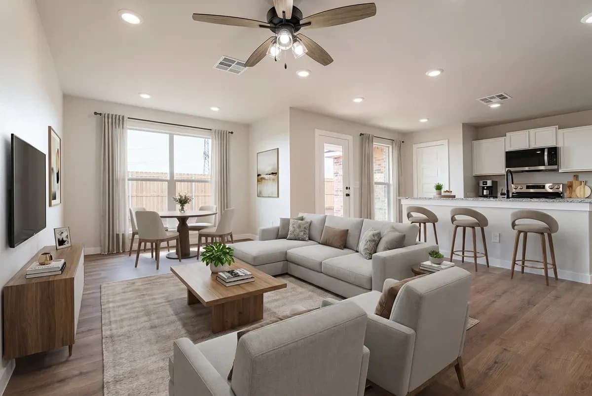 Living room with sectional sofa in The DeSmet home model by Buffalo Built LLC.