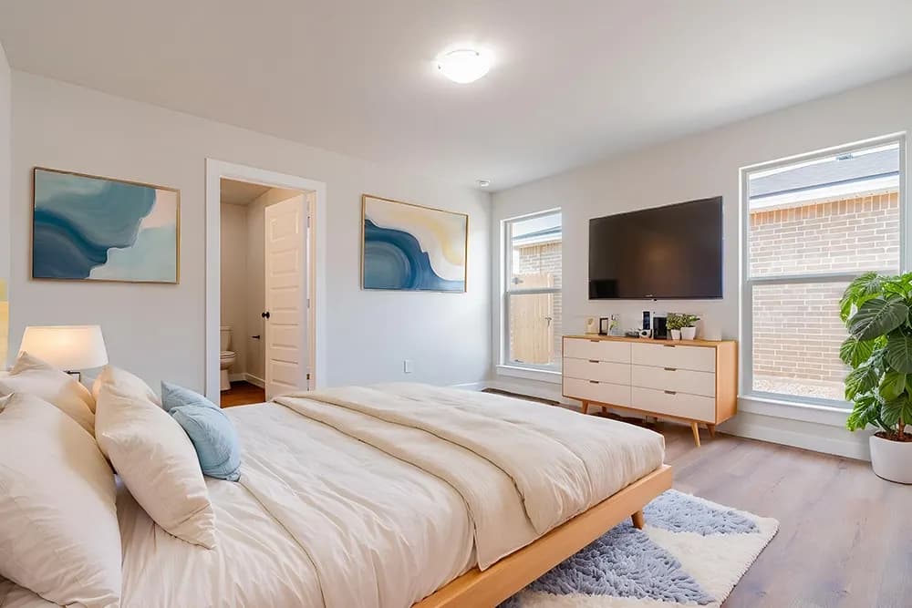 Primary bedroom in The DeSmet home model by Buffalo Built LLC.