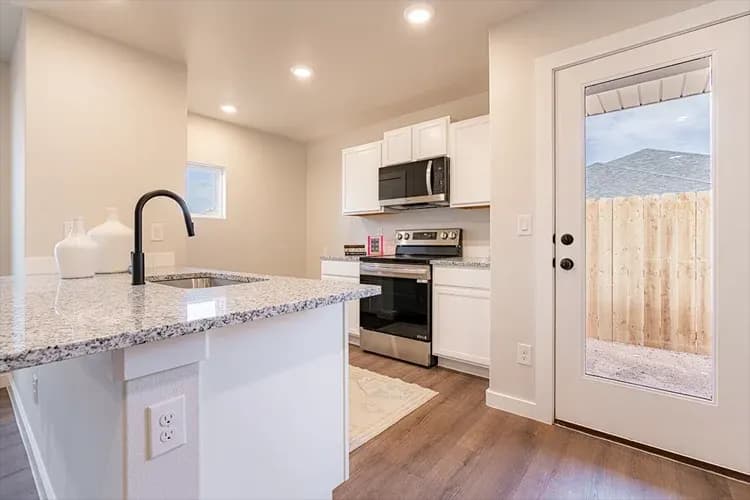 Kitchen, shared between The French Creek and The Outlaw floor plans by Buffalo Built LLC.