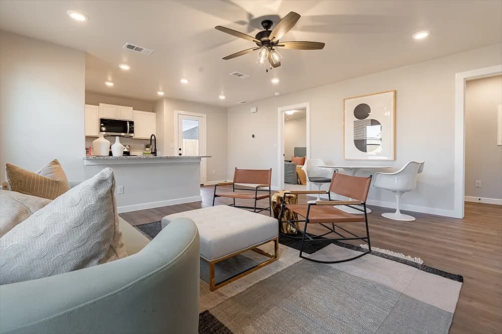 Open living room and kitchen, shared between The French Creek and The Outlaw floor plans by Buffalo Built LLC.