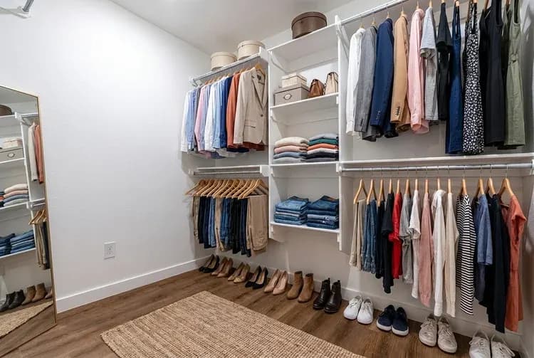 Walk-in closet, alternate view, in The Geneva home model by Buffalo Built LLC.