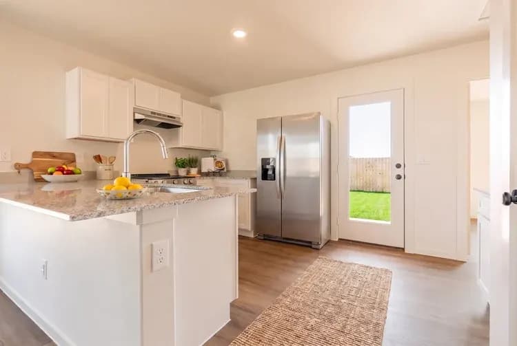 Kitchen in The Little Big Horn home model by Buffalo Built LLC.