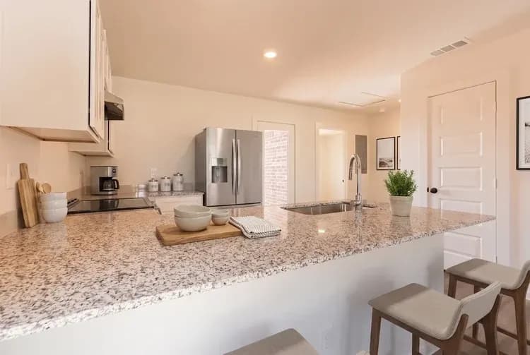 Kitchen island in The Little Big Horn home model by Buffalo Built LLC.
