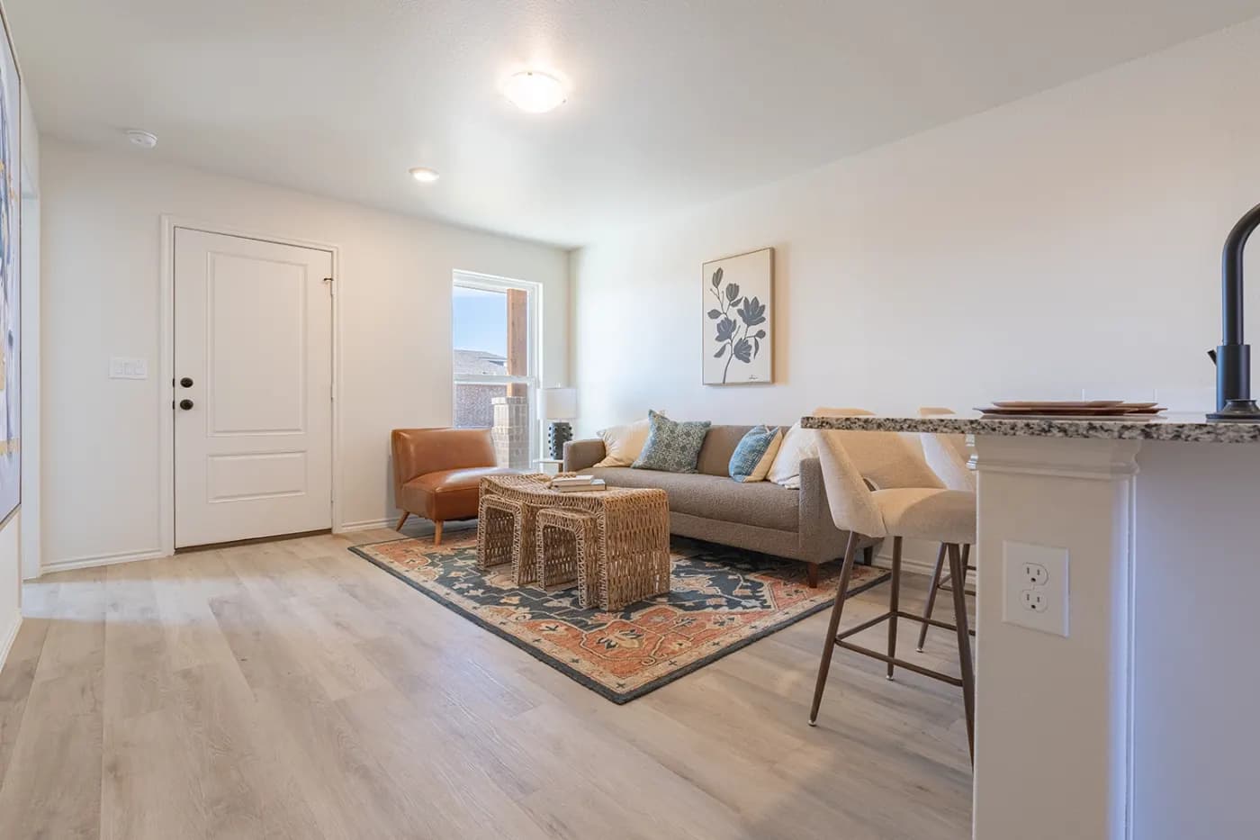 Living room viewed from the front entry in The Little Big Horn home model by Buffalo Built LLC.