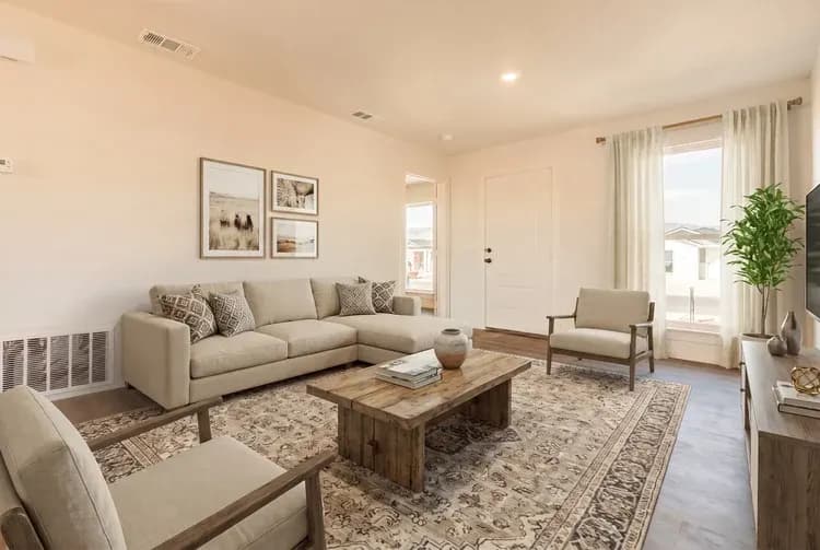 Living room with sectional sofa, alternate view, in The Little Big Horn home model by Buffalo Built LLC.