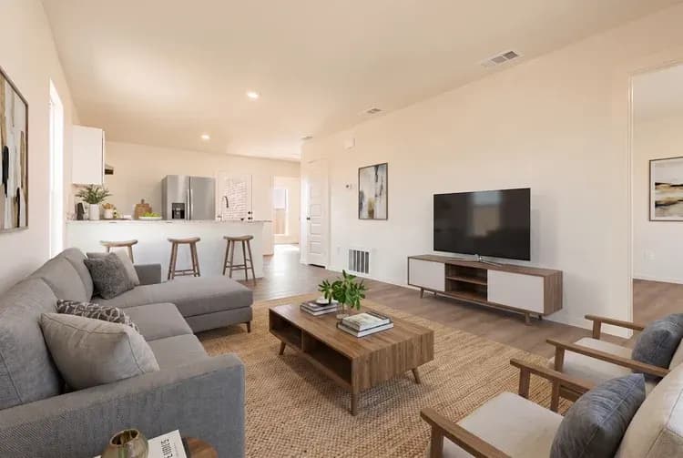 Living room with sectional sofa in The Little Big Horn home model by Buffalo Built LLC.