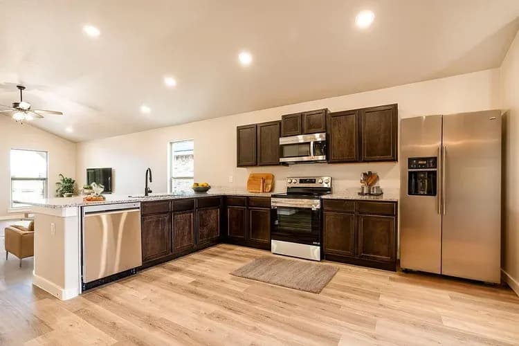 Kitchen, alternate view, in The Meadow Lark home model by Buffalo Built LLC.