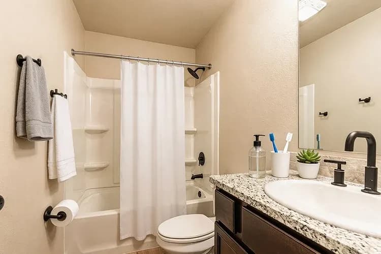 Primary bathroom in The Meadow Lark home model by Buffalo Built LLC.