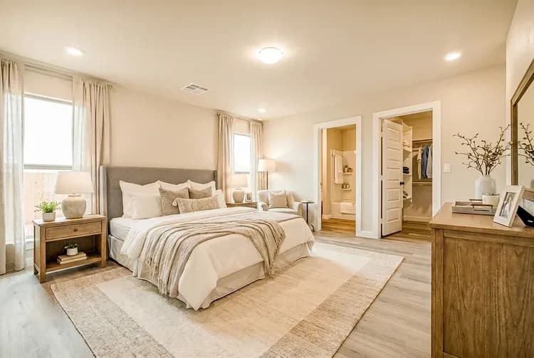 Primary bedroom, alternate staging, in The Meadow Lark home model by Buffalo Built LLC.