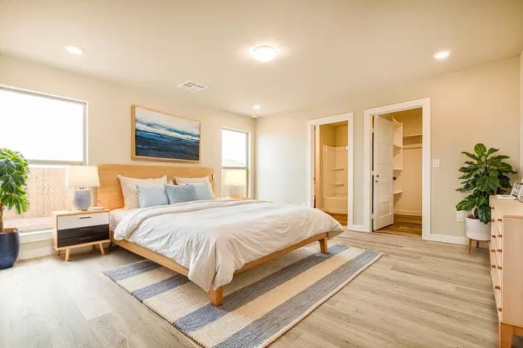 Primary bedroom in The Meadow Lark home model by Buffalo Built LLC.