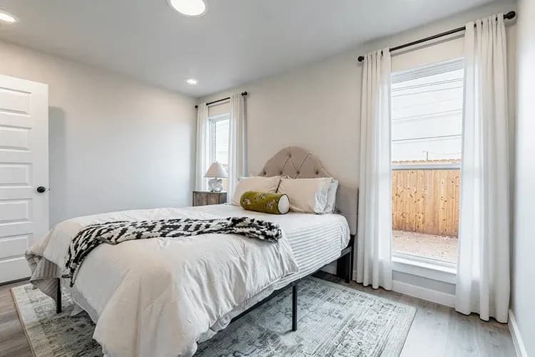 Bedroom in The Piney Creek home model by Buffalo Built LLC.