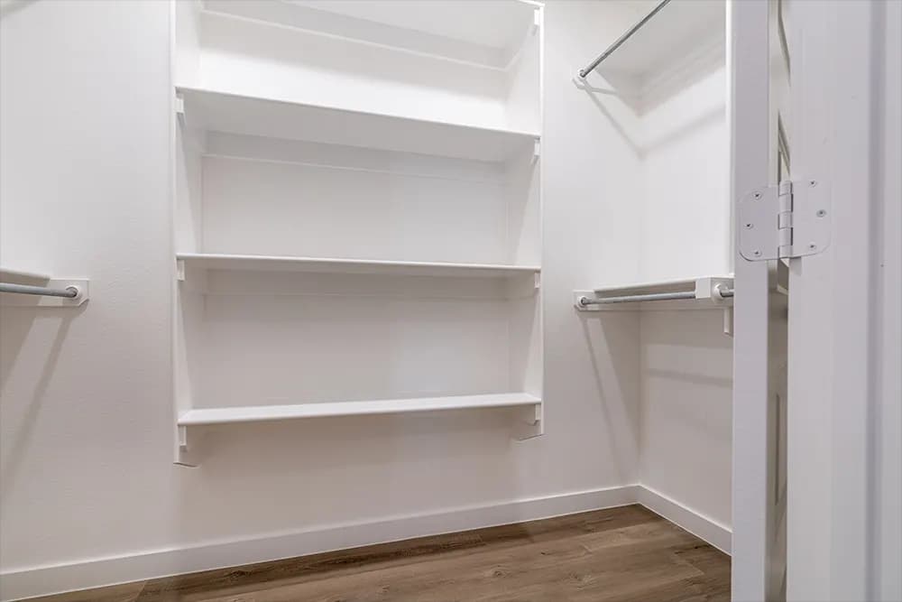 Walk-in closet in The Piney Creek home model by Buffalo Built LLC.