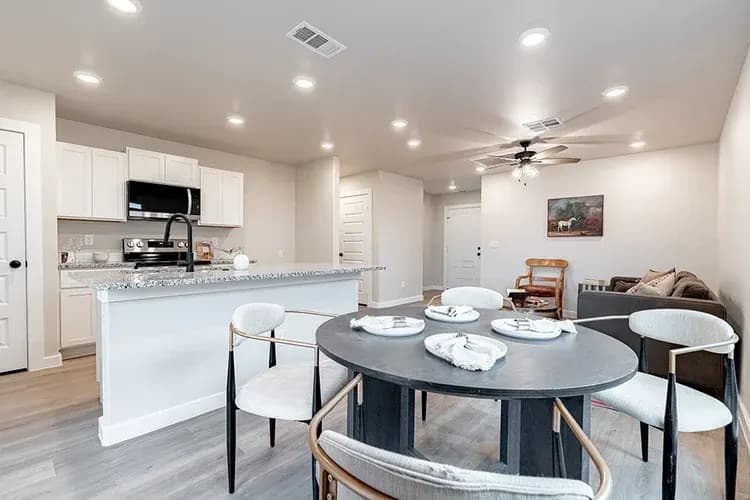 Kitchen and dining area in The Piney Creek home model by Buffalo Built LLC.