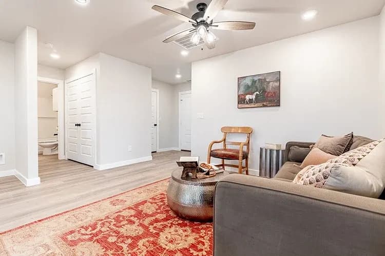 Living room, alternate staging, in The Piney Creek home model by Buffalo Built LLC.