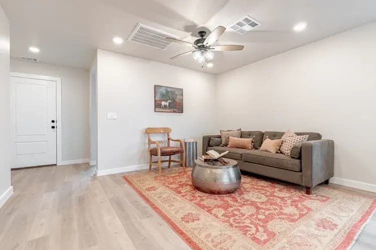 Living room sofa in The Piney Creek home model by Buffalo Built LLC.
