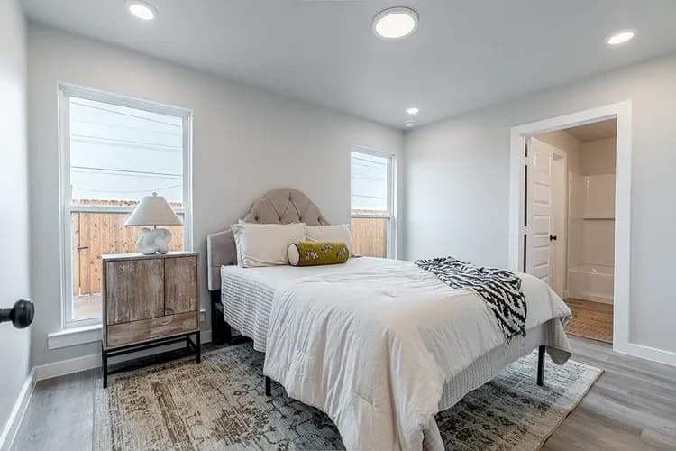 Primary bedroom, alternate view, in The Piney Creek home model by Buffalo Built LLC.