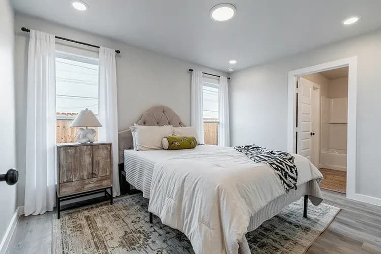 Primary bedroom in The Piney Creek home model by Buffalo Built LLC.