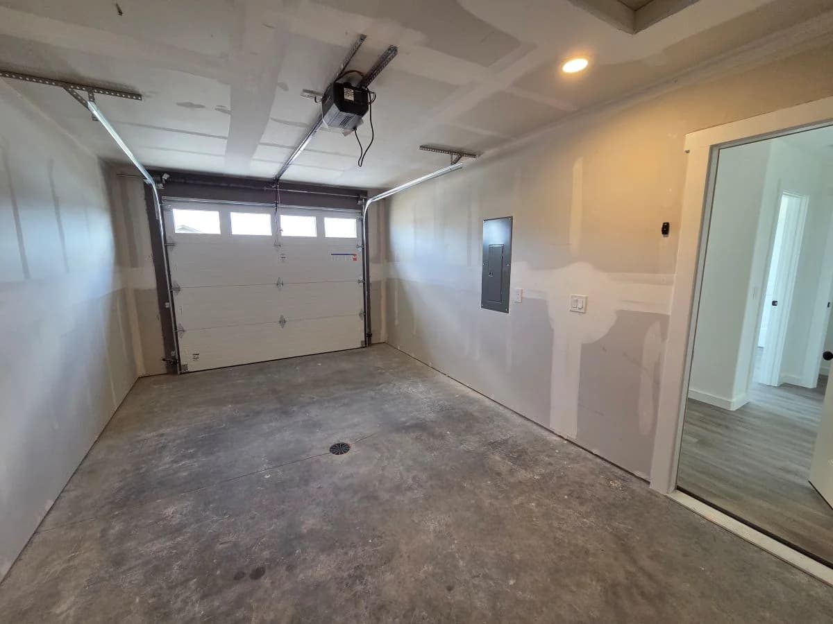 Attached garage in the finished Tie Hack completed home