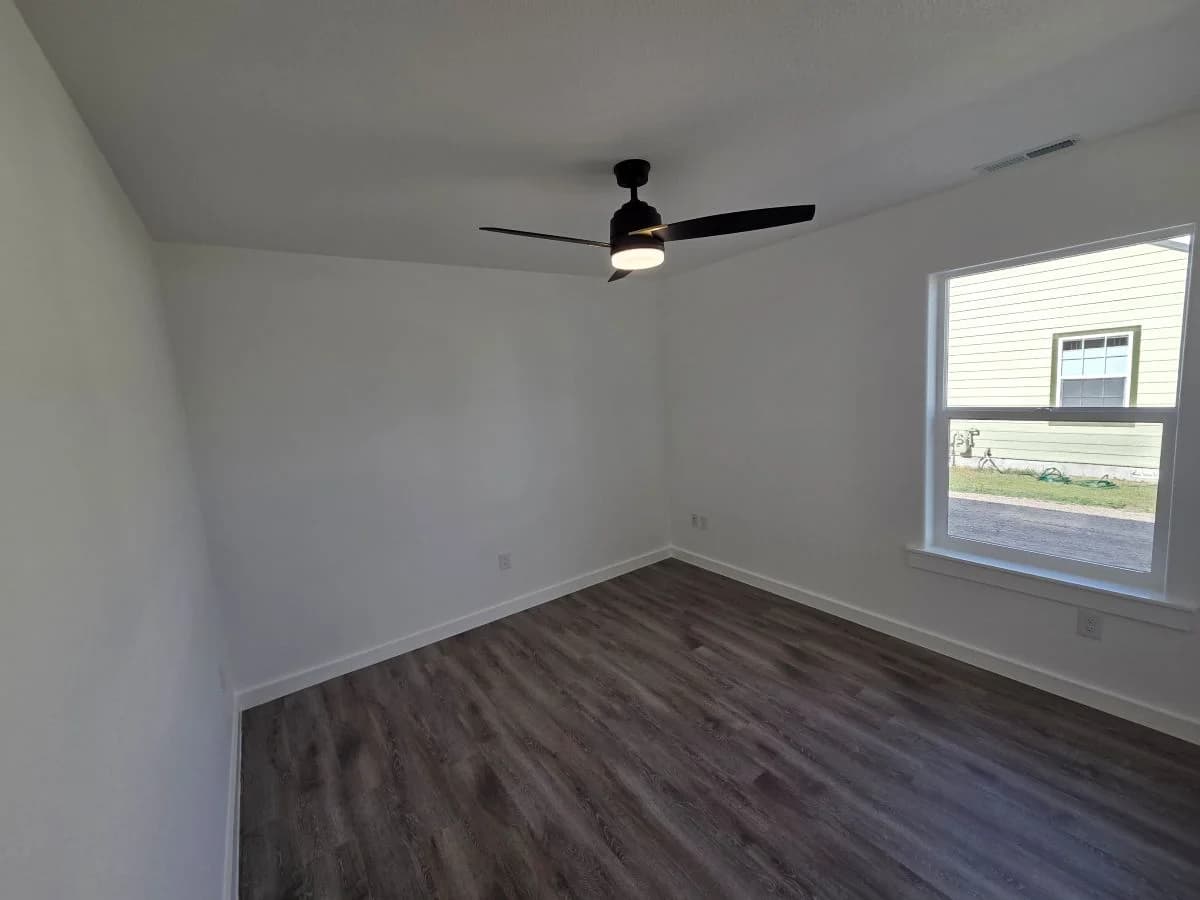 Bedroom 3 with double-door closet in the finished Tie Hack completed home